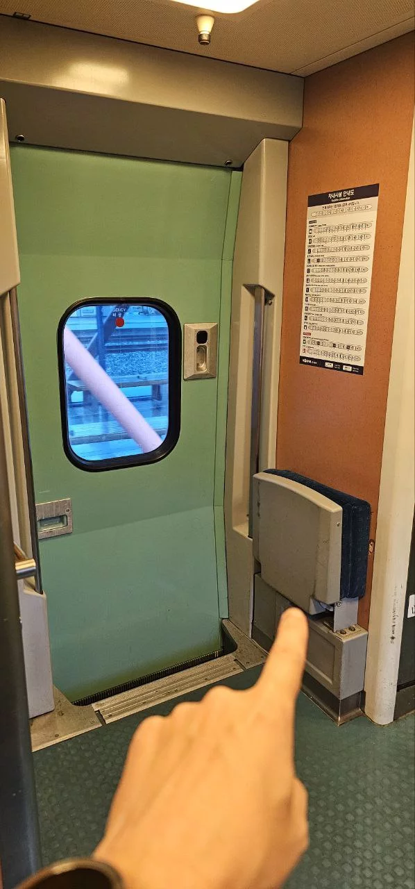Jump seat on KTX train from Seoul to Busan